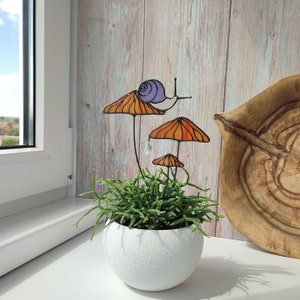 Magical Snail on Orange Mushroom Plant Stake. Enchanting Stained Glass Garden Decoration