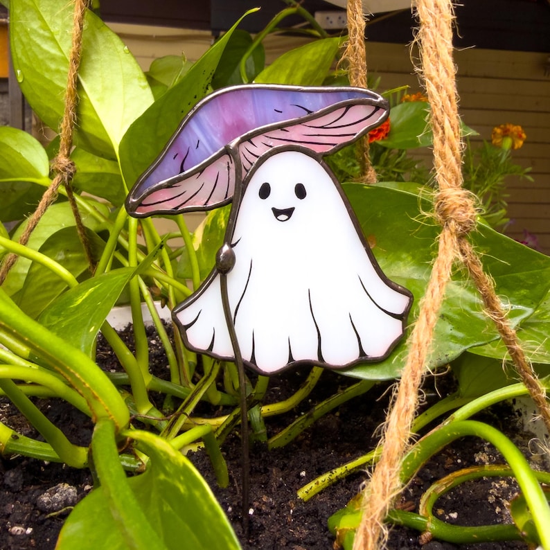 Stained glass ghost under purple mushroom plant stake. Christmas gift for mom. Cute ghost decor, handmade mushroom gift, whimsical garden decor