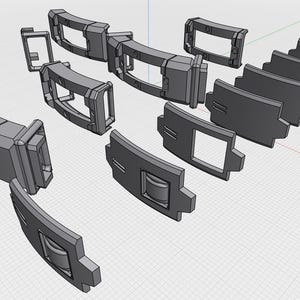 May include: A collection of grey, three-dimensional, curved mechanical components arranged in a grid. These modular parts feature rectangular openings, integrated rollers, and interlocking edges, presented as a digital 3D model rendering.