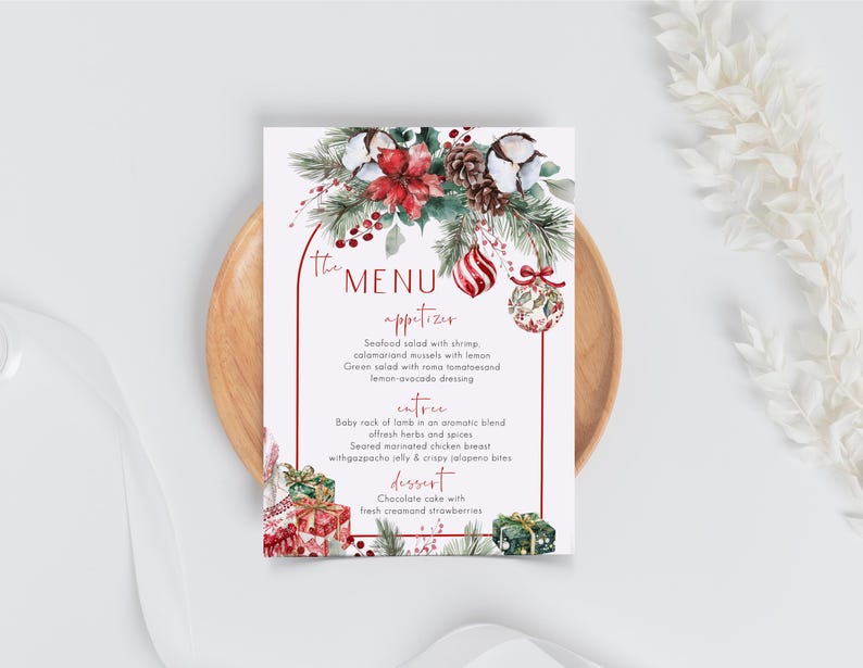 May include: A rectangular menu card featuring a red arched border, watercolor illustrations of poinsettias, pine branches, pinecones, cotton bolls, and Christmas ornaments. The text reads The Menu, appetizer, entree, and dessert with food items listed.