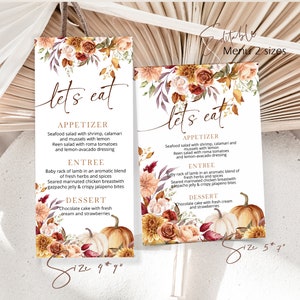 May include: Two printable fall-themed menu templates with a floral border and pumpkins. The text on the menu says "Let's Eat" and lists appetizers, entrees, and desserts. The menu is available in two sizes: 4x9 inches and 5x7 inches.