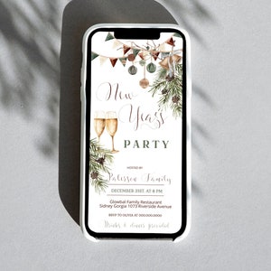 May include: A smartphone displays a New Year's Party invitation. The design features champagne flutes, festive banners, and greenery. The invitation includes the text "New Years Party" and event details, all in elegant script.