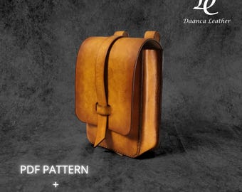 May include: A brown leather crossbody bag with a flap closure and a strap with a buckle. The bag is on a gray background. PDF PATTERN + VIDEO TUTORIAL