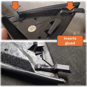 Può includere: Primo piano di un componente in plastica nera con inserti incollati. Il componente ha una superficie strutturata e una striscia di velcro nero. Il testo "Inserts glued" è in un rettangolo arancione.