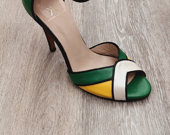 Introducing our vibrant collection of handmade sandals in a cheerful yellow, refreshing green, and stylish black combination!