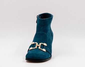 Handmade suede ankle boots in turquoise colour