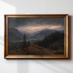 May include: A framed landscape painting depicting a mountain range under a dramatic, cloudy sky. The artwork features a dark color palette with shades of blue, green, and brown, and is encased in a wooden frame.