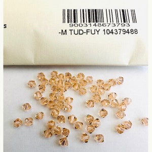 50pcs Swarovski® 4mm Peach  Bicone  Beads 5301 Bicone Crystal