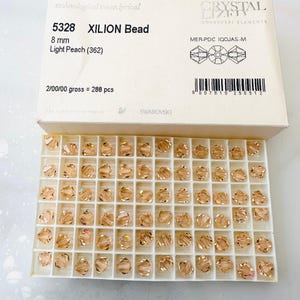 10pcs Swarovski® Light Peach 5328 XILION Bicone Beads  -  Fully drilled -  8mm size