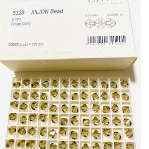 10pcs Swarovski® Crystal Greige XILION   Bicone Beads  - Fully drilled  -  8mm size 5328