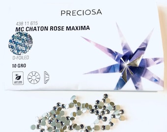 May include: A small package of 10 gross of clear chaton rose maxima crystals, D-foiled, by Preciosa. The package is white with a silver star design and the text "PRECIOSA" and "MC CHATON ROSE MAXIMA".