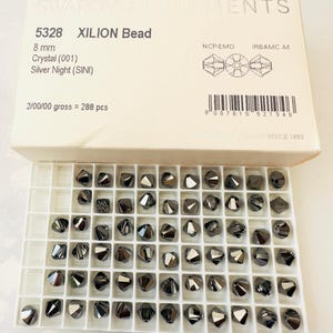 10pcs Swarovski® Crystal silver night  5328 XILION Bicone Beads  -  Fully drilled -  8mm size
