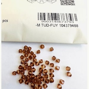 50pcs Swarovski® 4mm Light Smoked topaz  Bicone  Beads 5301 Bicone Crystal