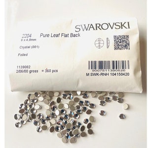 8pcs Swarovski®  Pure Leaf Flatback 6x4.8mm Non hotfix Tooth Gem Nail art rhinestones Crystal ref : 2204