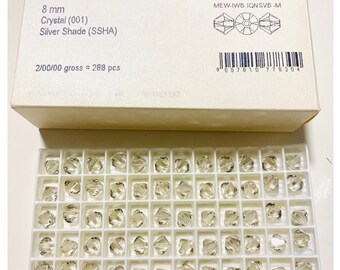 10 perles toupies en cristal Swarovski®, nuance argentée XILION - Entièrement percée - 8 mm taille 5328 artisanal