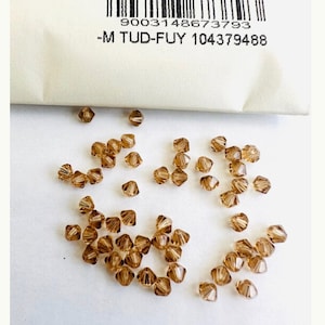 50pcs Swarovski® 4mm Light Colorado topaz  Bicone  Beads 5301 Bicone Crystal