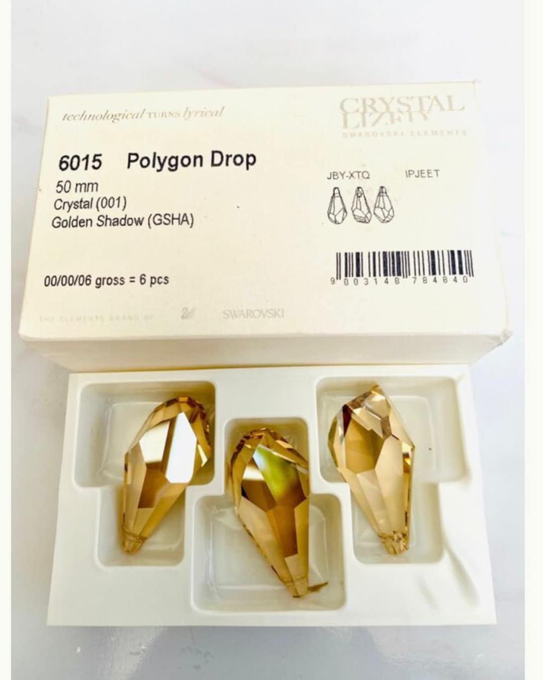 オリジナルスワロフスキー® 50 mm ゴールデンシャドウ ポリゴン