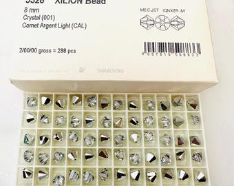 10 pièces Swarovski® Crystal comet argent light 5328 XILION perles toupies - Entièrement percée - Taille 8 mm