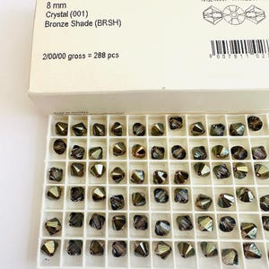 10pcs Swarovski® Crystal Bronze shade  XILION   Bicone Beads  - Fully drilled  -  8mm size 5328