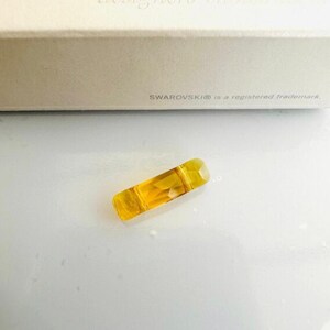 1 Stück Original Swarovski® 19x5mm Light Topaz 5535 -Column (Two Holes) Bead