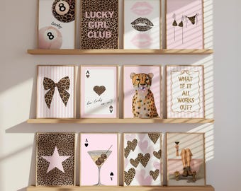 May include: A collection of framed art prints featuring a variety of designs. Prints include an 8-ball, lips, a bow, playing cards, a cheetah, and text that reads "Lucky Girl Club" and "What if it all works out?" The color palette includes pink, brown, and black.