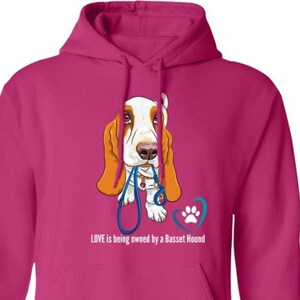 Love is being owned by a Basset Hound Hoodie in lots of colors and sizes for your Basset Hound friends and family.