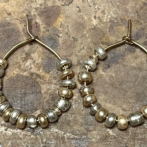 Golden and silver beaded hoop earrings with golden hoop made by me