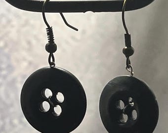 Button earrings.
