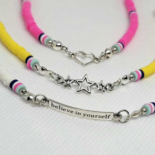 whimsical clay charm Bracelet set: yellow star,  pink heart,  white 'believe in yourself' quote, adjustable length