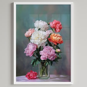 Puede incluir: Impresión enmarcada de un ramo de peonías en un jarrón de cristal transparente. Las flores son de color rosa, blanco y naranja, con hojas verdes. Una sola peonía roja descansa sobre la mesa. El fondo es verde y azul suave.