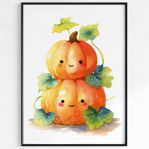 Puede incluir: Ilustración en acuarela de dos calabazas apiladas con caras sonrientes y hojas verdes. Las calabazas son naranjas con un tallo marrón, y las hojas son verdes y amarillas. La obra está enmarcada.