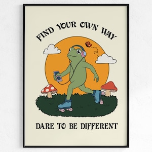 Puede incluir: Impresión artística enmarcada que muestra una rana verde con patines, escuchando música. La rana está frente a un sol amarillo, con nubes, setas y el texto "FIND YOUR OWN WAY DARE TO BE DIFFERENT".