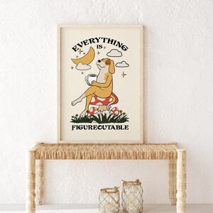 Everything is figureoutable dog poster with coffee cup, motivational dog wall art for office, inspirational dog quote print, coffee-loving dog decor for home, positive mindset poster with dog, cute dog drinking coffee artwork, dog lover gift with quote, cozy coffee nook dog decor, everything is figureoutable Marie Forleo dog print, relaxed dog sipping coffee illustration, self-help themed dog poster, mental wellness dog art print, funny dog quote wall art, mindfulness dog drinking coffee poster