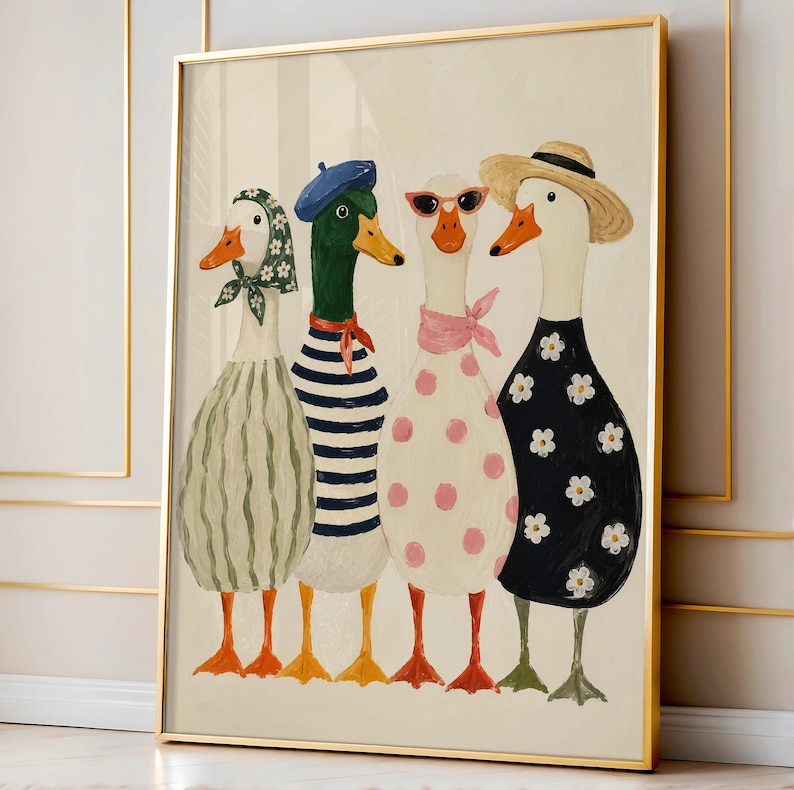 May include: A framed art print featuring four anthropomorphic geese. Each goose is dressed in unique attire, including a striped shirt, beret, sunglasses, and a straw hat. The geese are depicted in a whimsical, colorful style, with a cream-colored background.