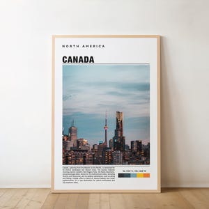 May include: A poster with a photo of the Toronto skyline, including the CN Tower. The poster is titled "Canada" and is part of a series called "North America".