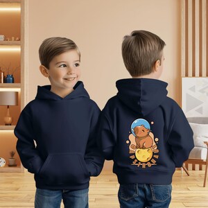 Sudadera con capucha de astronauta capibara, sudadera juvenil, ropa acogedora para niños, regalo para amantes de los osos, ropa divertida para niños con animales, ideal para cumpleaños