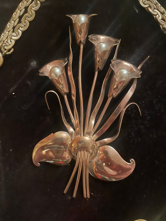 Elegant 1930s copper brooch