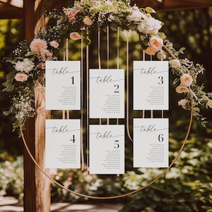 wedding seating chart
table number cards
wedding table number
seating chart cards
wedding reception
table assignment card
wedding seating chart
minimalist wedding
editable template
acrylic wedding sign
rehearsal dinner
table number signs
printable table numbers
wedding table decor
find your seat
Elegant Table Assignment Seating Chart 
Wedding Reception Card Template 
Rehearsal Dinner Table Number