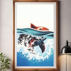 Puede incluir: Lámina artística enmarcada que representa un pez rompiendo la superficie del agua. La obra de arte presenta un pez rojo y blanco sobre un fondo oceánico azul y blanco. La impresión se presenta en un marco de madera, ideal para la decoración del hogar.
