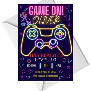 May include: A neon-colored video game controller invitation for a birthday party. The invitation says "Game On! Oliver Has Reached Level 10!" with the date, time, and address below.
