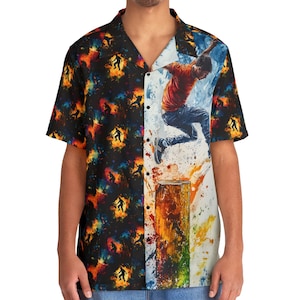 May include: A short-sleeved button-up shirt with a colorful abstract design. One side of the shirt features a black background with a repeating pattern of silhouettes of people jumping. The other side of the shirt features a colorful abstract design with a person jumping over a wooden log.