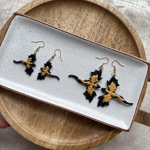 Handmade Black and Gold Dragon Earrings: Polymer Clay Jewelry