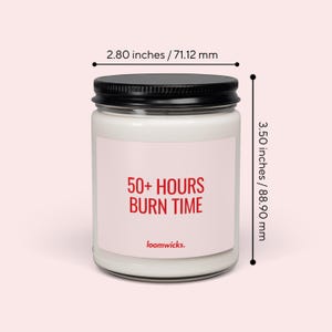 a candle labeled "50+ HOURS BURN TIME" with a black lid, and it is described as having a size of 2.80 inches/71.12 millimeters.