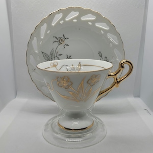 Tea Cup and Saucer Delicate White with Gold Filigree