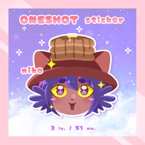 May include: A 2-inch sticker featuring a cartoon cat with purple hair wearing a brown hat with a stack of pancakes on top. The cat has brown skin, yellow eyes, and a pink tongue sticking out. The background is a purple and blue gradient with white clouds.
