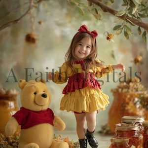 May include: A young girl in a yellow and red dress with a red bow in her hair smiles next to a plush bear wearing a red shirt. Honey jars and bees are in the background. The text "A. Faith Digitals" is visible.