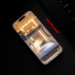 Pode incluir: Um smartphone exibindo uma foto de um pequeno pod moderno branco com duas camas, uma sobre a outra. O pod tem um interior claro com uma pequena lâmpada e uma janela. O horário exibido na tela do telefone é 12:57.