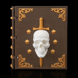 May include: A brown rectangular book cover with a textured surface, featuring gold-colored corner filigree, a central white skull impaled by a gold-colored sword, and six small gold-colored pentagonal shapes arranged in a circular pattern around the skull.