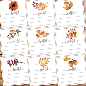 May include: Nine printable cards with fall-themed illustrations and the text "I am thankful for" or "I am grateful for".