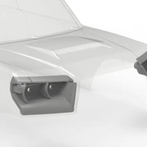 Puede incluir: Modelo de plástico transparente gris claro de la parte delantera de un coche. El modelo incluye el capó, los faros y una parte de las aletas delanteras. Los faros son de un gris más oscuro.
